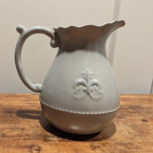 Anthropologie | Fleur de Lys stoneware olive pitcher